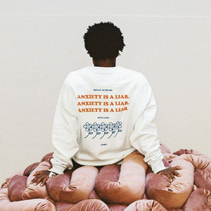 ANXIETY IS A LIAR SWEAT WHITE - IVORY WORLD