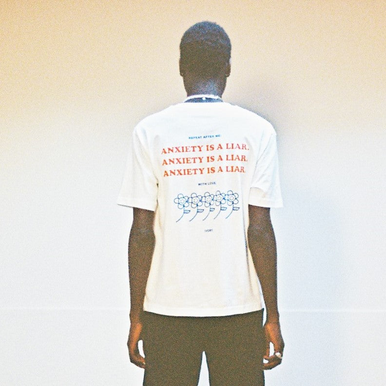 ANXIETY IS A LIAR TEE WHITE - IVORY WORLD
