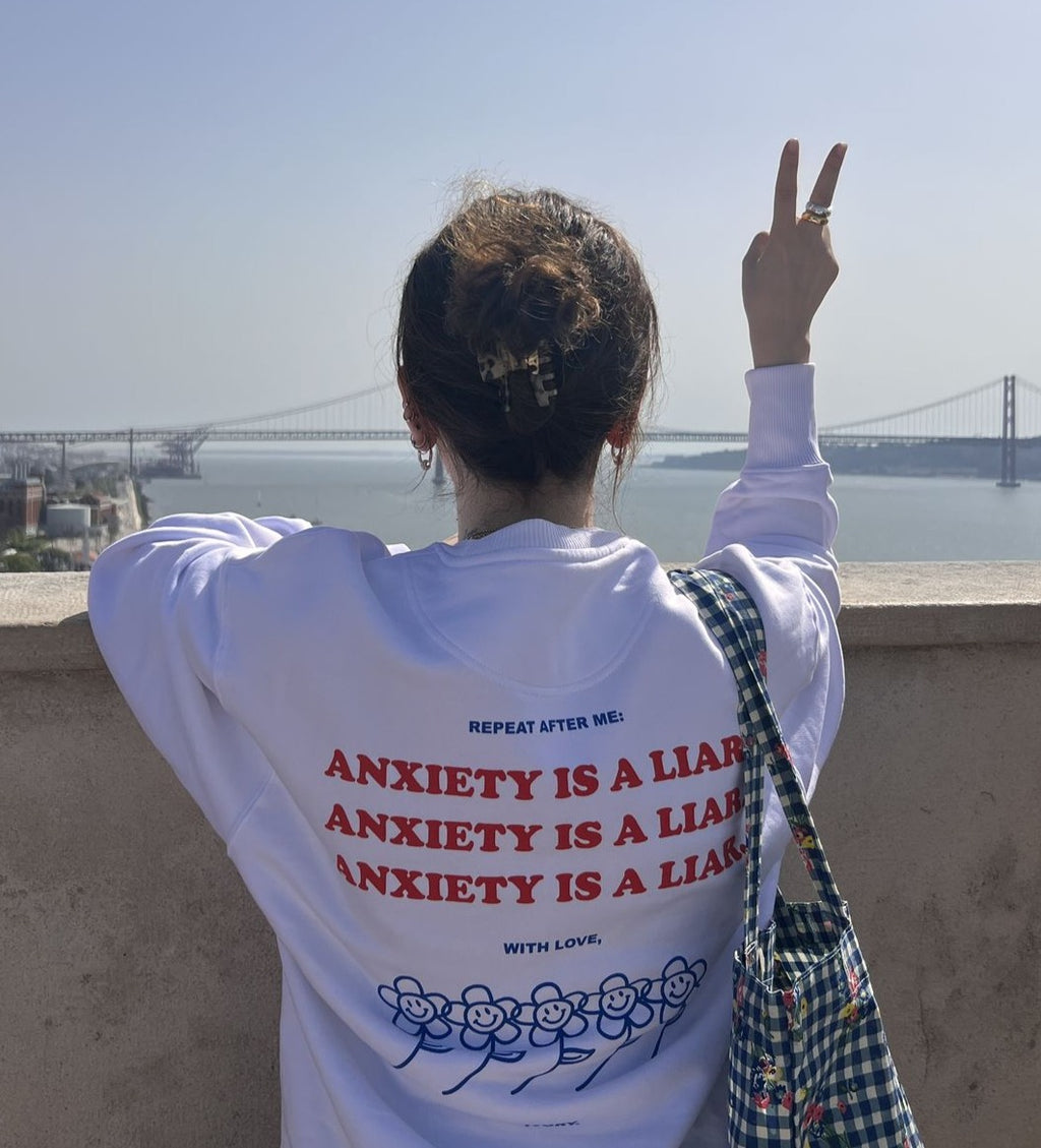 ANXIETY IS A LIAR SWEATSHIRT RAW RED
