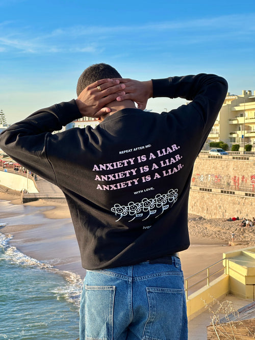 ANXIETY IS A LIAR SWEATSHIRT BLACK PINK
